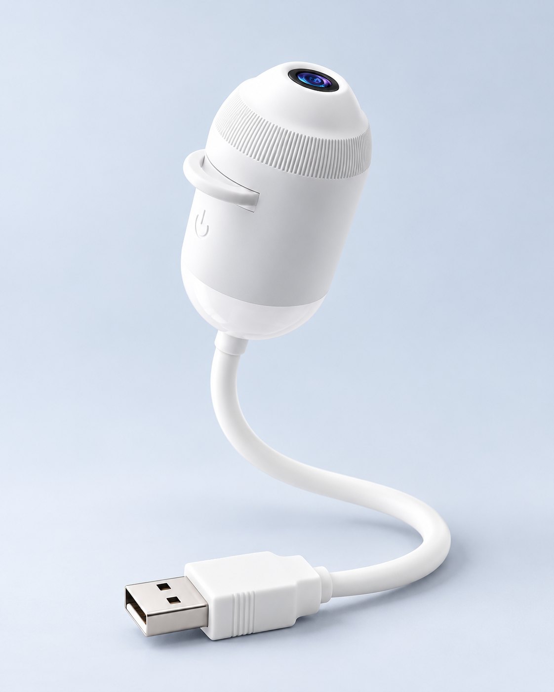 Le projecteur Moonyx : une petite tête blanche, l'objectif sur le dessus, un câble souple et sa prise USB